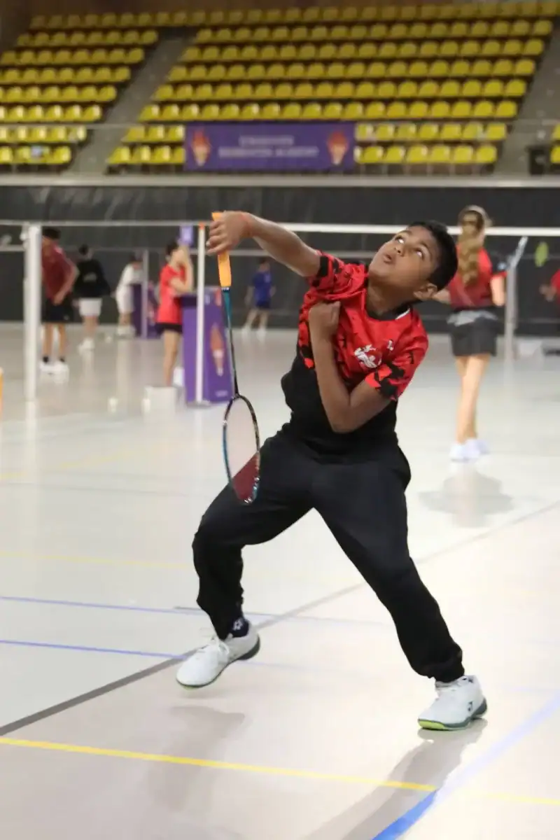 Boy playing an overhead shot at Junior Master EBA 2026
