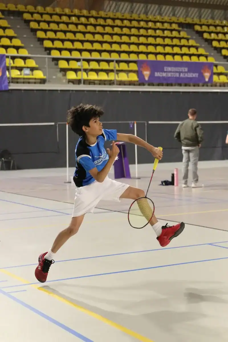 Boy lunging for the shuttle at Junior Master EBA 2026