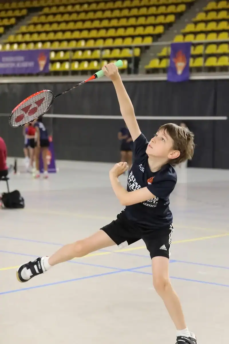 Junior player hitting an overhead smash at Junior Master EBA 2026