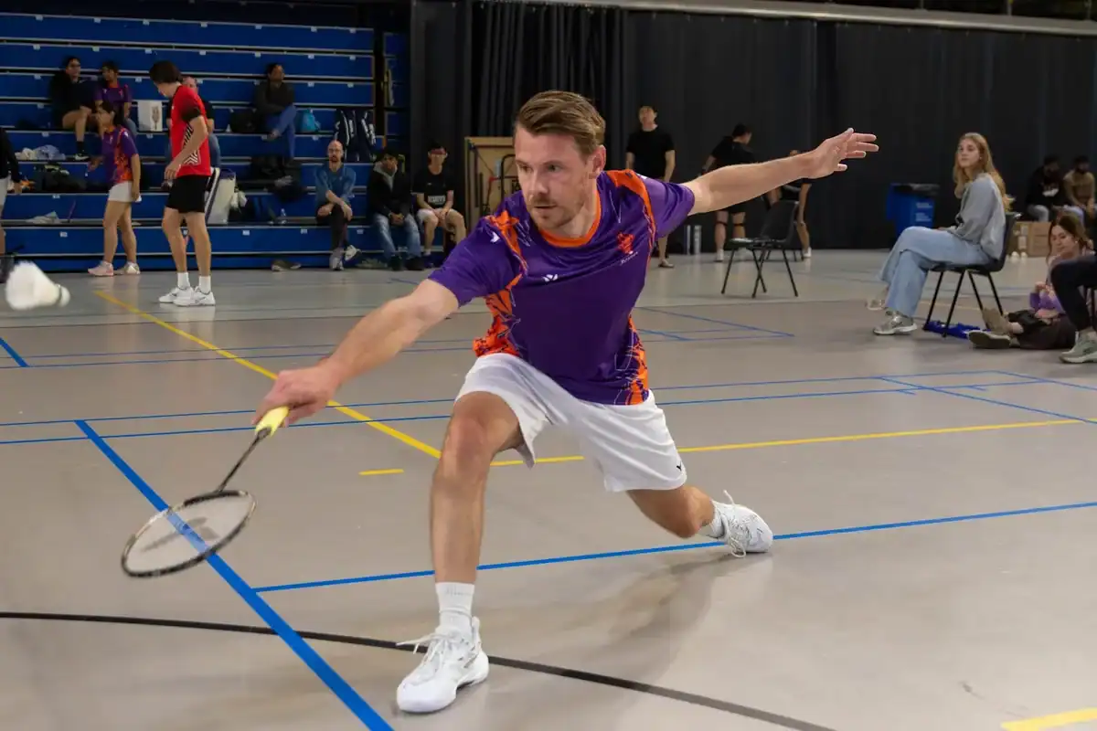 Rick Steuten of Rudra United lunging for a forehand in his singles match