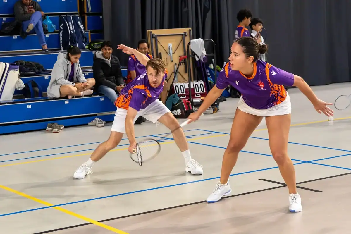 Rudra United mixed doubles pair in ready position during the Eerste Divisie match